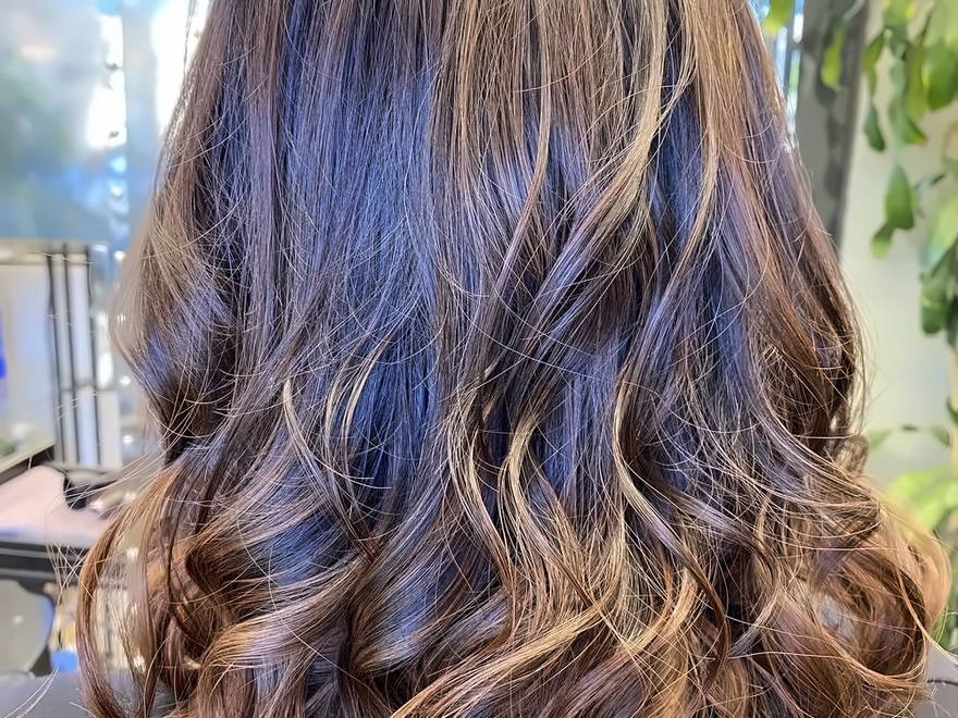 A shoulder-length balayage cut finished at Salon 206